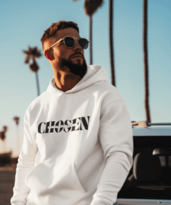 Man in white hoodie and sunglasses by car