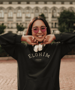 Smiling woman wearing sunglasses and headphones
